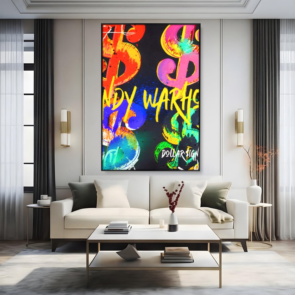 Tablou canvas cu tablou canvas cu simboluri dollar colorate, in rama de aluminiu negru, pe perete intr-un living
